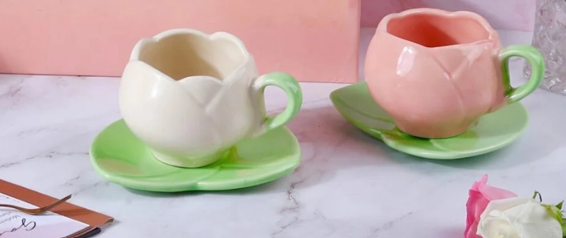 Ivory and blush Bloom Cups on green leaf saucers